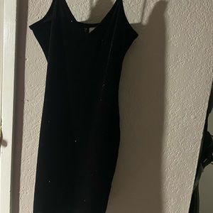 Short black glittery body con dress